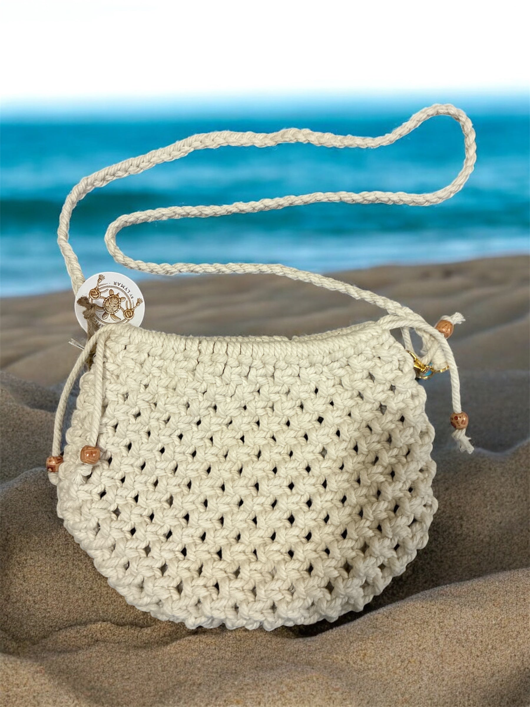 Cartera semicircular en macramé